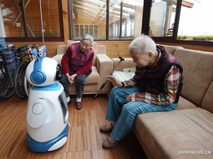 Фото с сайта «<a href="http://www.news.cn">Синьхуа</a>» / Миллионы роботов — китайское решение проблемы ухода за пожилыми людьми